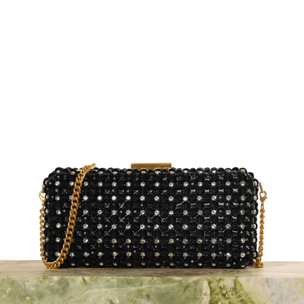 <tc>Clutch</tc> Borde largo